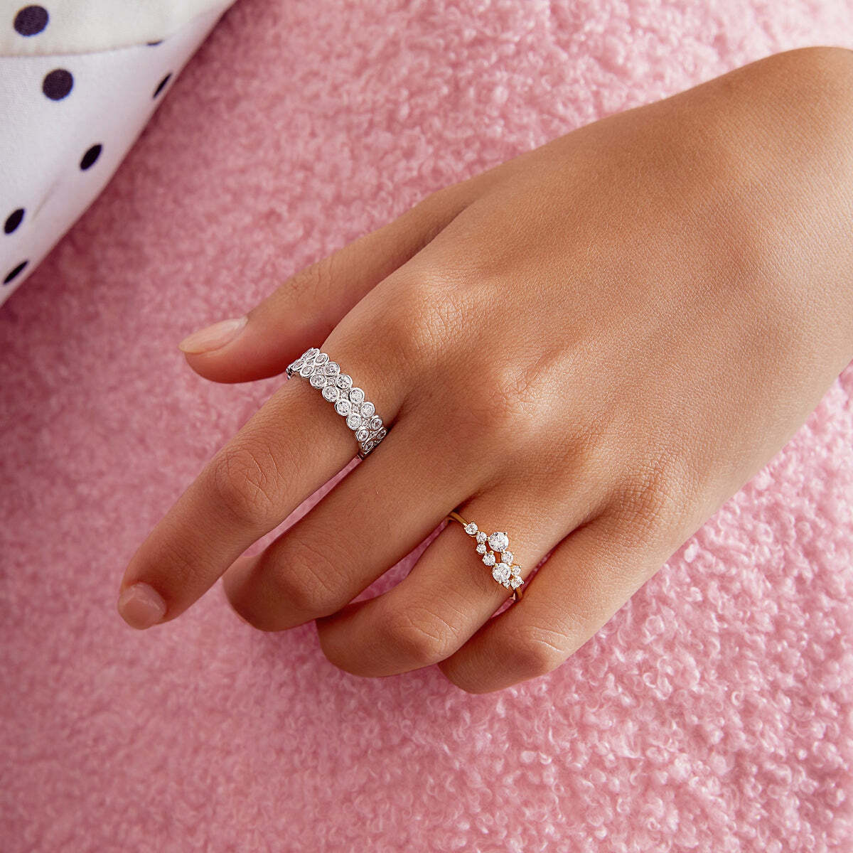 Product Description: Set with double rows of glittering cubic zirconia in rhodium plated sterling silver, the stunning piece is sure to make a statement in any ring stack. Wear it alone or stacked with other pieces to create stunning styles. Product Details: • Material: 925 Sterling Silver with Rhodium Plating with Cub Silver Double Row Bezel Ring– Ania Haie US