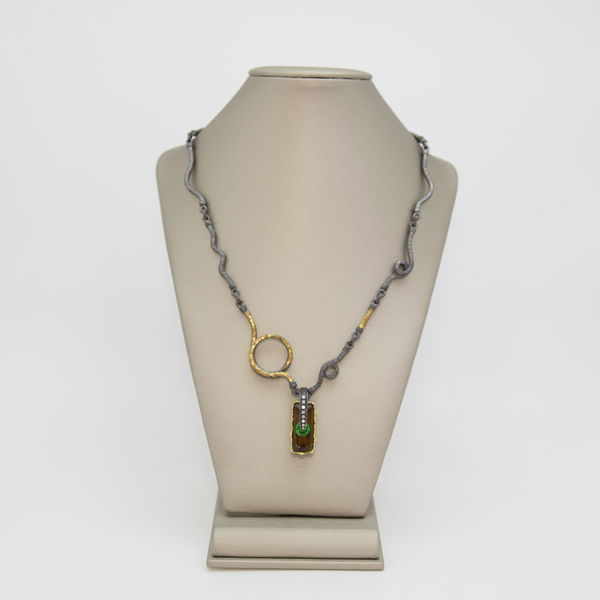 Closeup photo of “Gold Lava” Bear Quartz, Tsavorite and Diamond 18K and Sterling Hittite Style Necklace