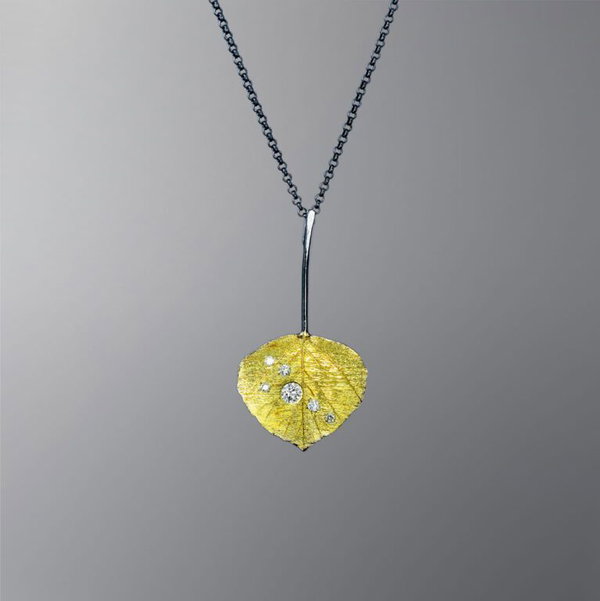 Closeup photo of Quaking Apen Leaf Pendant with Diamond