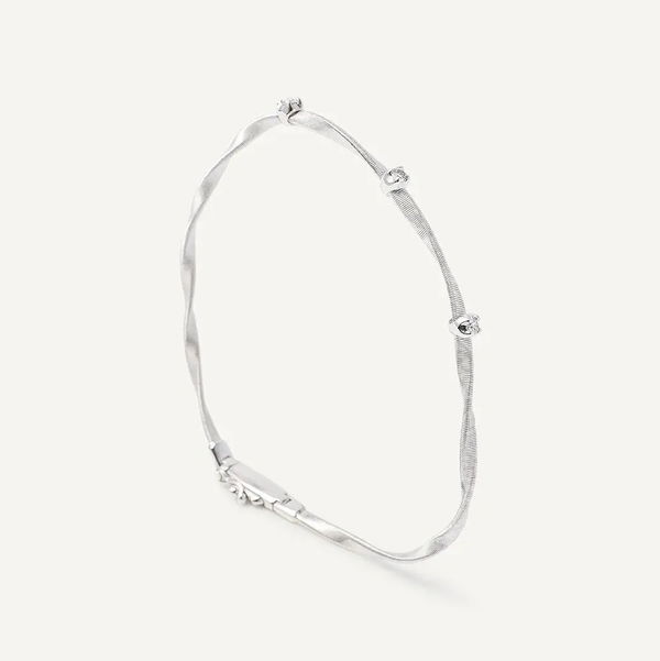 Closeup photo of 18K White Gold Twisted Coil Bracelet with Diamonds .15CT DIA