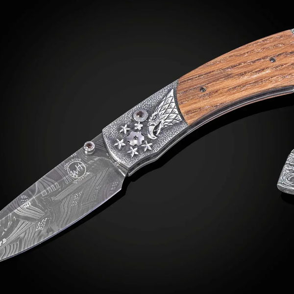 Closeup photo of USA 250th - Hand-carved sterling silver with wood from Independence Hall