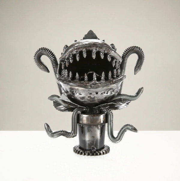 Closeup photo of Audrey Two Inspired Recycled Metal Sculpture