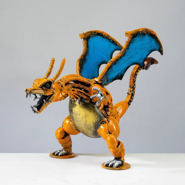 Closeup photo of Charizard Pokemon Inspired Recycled Metal Sculpture