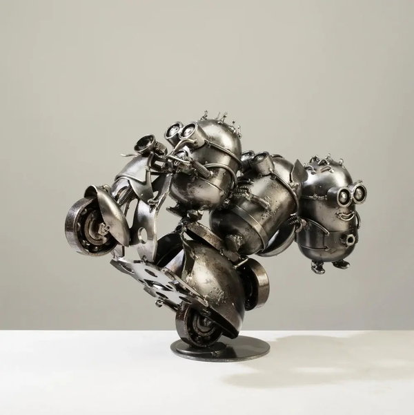 Closeup photo of Minion Party Moped Inspired Recycled Metal Sculpture