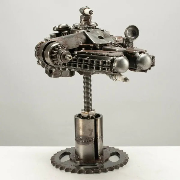 Closeup photo of 10" Millennium Falcon Inspired Recycled Metal Art