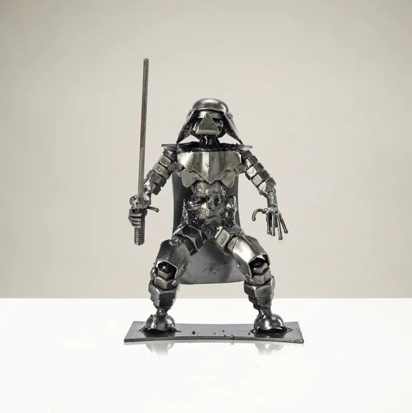 Closeup photo of Darth Vader with Sword Inspired Recycled Metal Sculpture