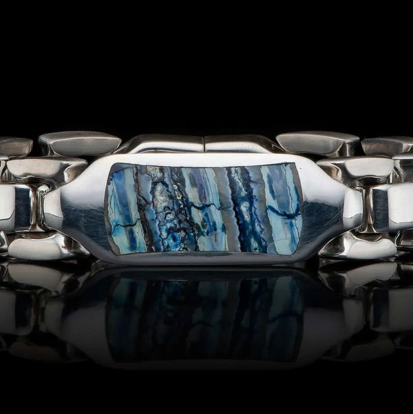 Closeup photo of Blue Mammoth Identity - Sterling Silver Bracelet inlaid with blue fossil mammoth tooth