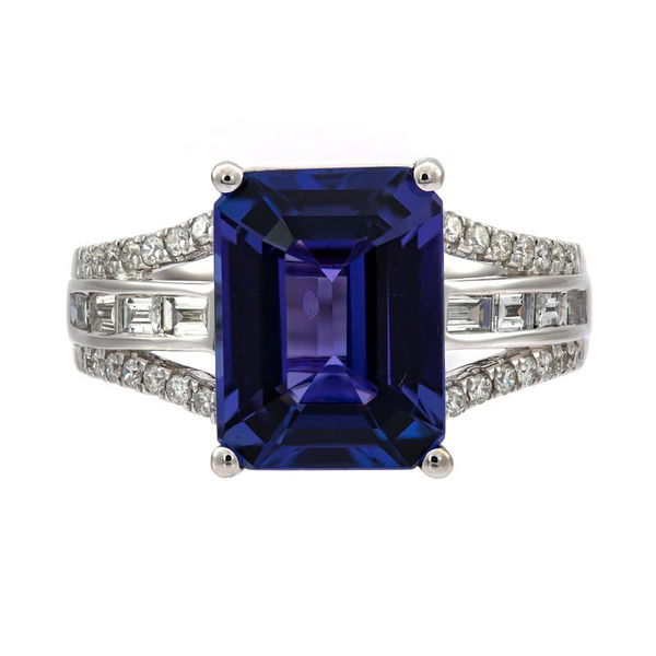 Closeup photo of 18KW 6.10CT TANZANITE WITH .64CT DIAMOND RING