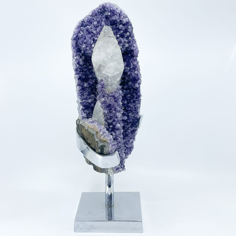 An amethyst cluster with calcite