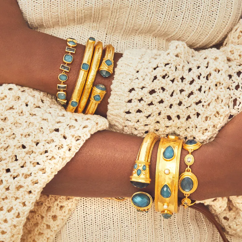 Julie Vos gold bangles with blue stones