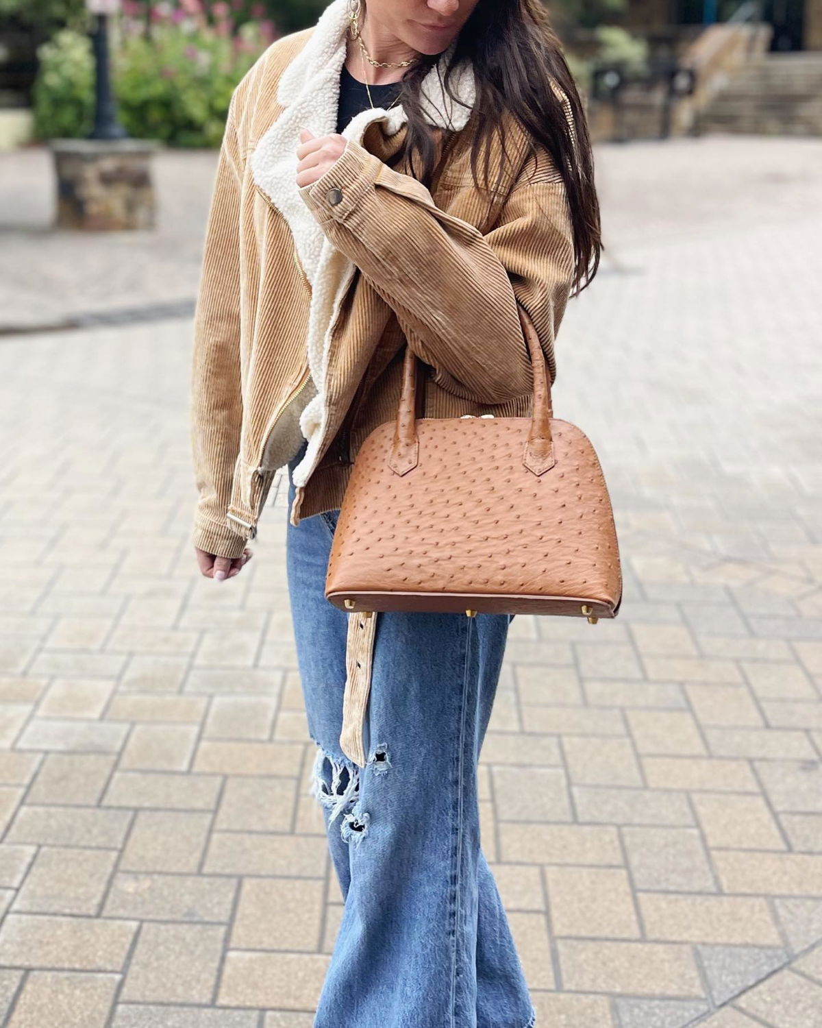 Ostrich leather handbag carried in Vail Village