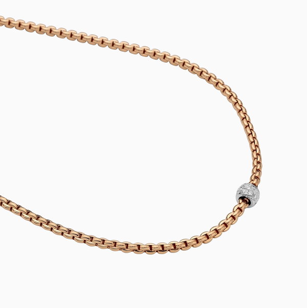 Closeup photo of EKA Tiny Necklace with Diamond Pavé