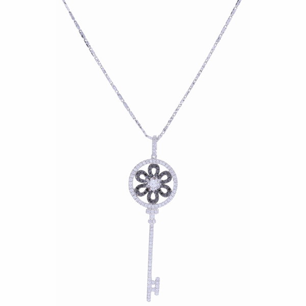 Closeup photo of 14K White Gold Black and White Diamond Key Necklace