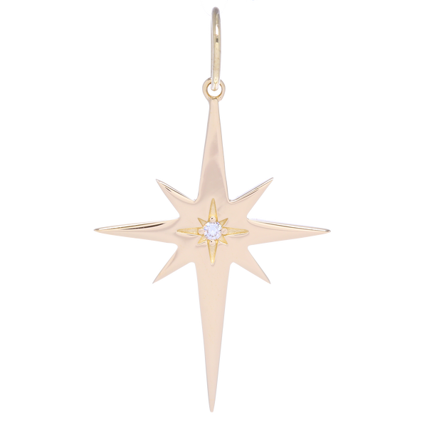 Closeup photo of Large Gold North Star Charm Pendant with a Diamond