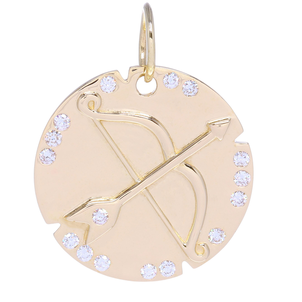 Closeup photo of Gold Bow and Arrow Pendant with Diamonds