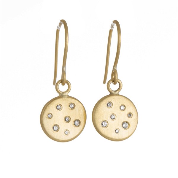 Closeup photo of 18k Gold Scattered Diamond Disc Earrings