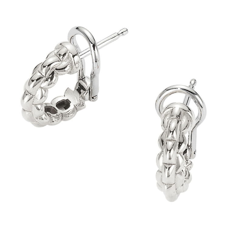 This stunning pair of Eka Plain Gold Huggie Hoop Earrings in White Gold by Fope is the perfect accessory for any occasion. Expertly crafted from 18k White Gold with a brilliant shine, these huggie hoops are the perfect way to add a touch of luxe to your look. The secure click closure ensures a comfortable, secure fit, and their timeless design brings a sophisticated elegance to any ensemble. With their exquisite craftsmanship, these earrings make a timeless addition to your jewelry collection. Eka Plain Gold Huggie Hoop Earring in White Gold