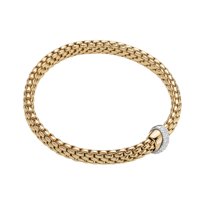 Flexible bracelet entirely made of 18 carat Yellow Gold with diamond rondel. 18k Yellow GoldDIA: 0.20tcwAvailable For Immediate Ship in Yellow Gold Size S (16 cm) Vendome Flex'It Bracelet with Diamond Ribbon Rondel in Yellow Gold Size S (16 cm)